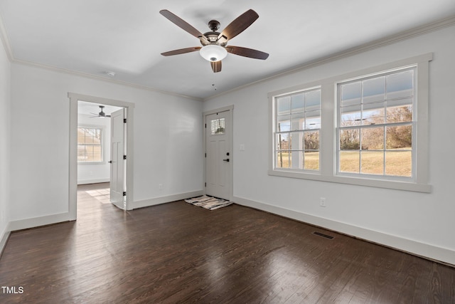 interior space featuring crown molding and dark wood-type flooring