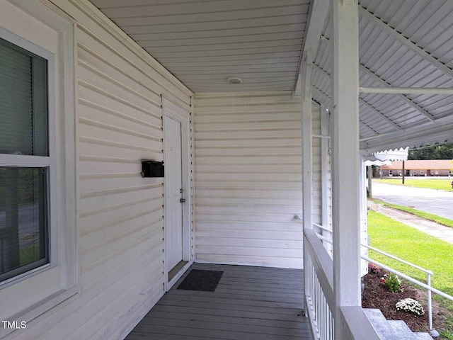 doorway to property featuring a porch