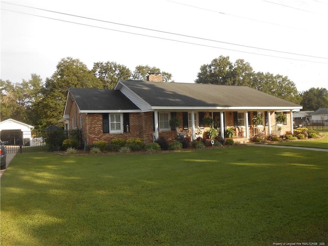 view of front facade featuring a front lawn and a porch