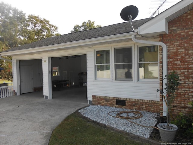 view of exterior entry with a garage