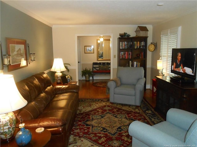 living room featuring crown molding and hardwood / wood-style floors