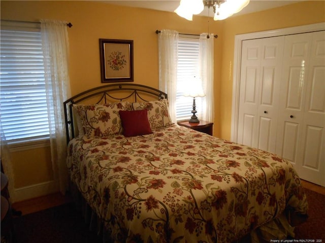 bedroom featuring a closet and ceiling fan