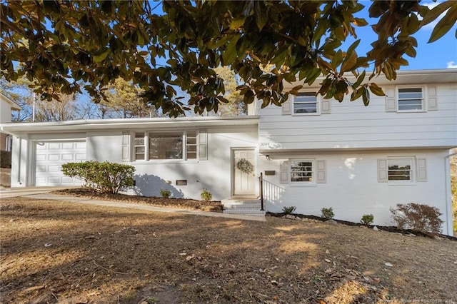 split level home with a garage