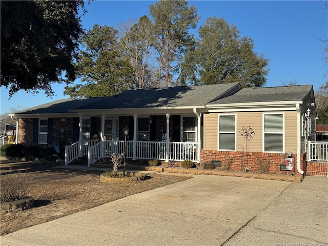 ranch-style home with covered porch