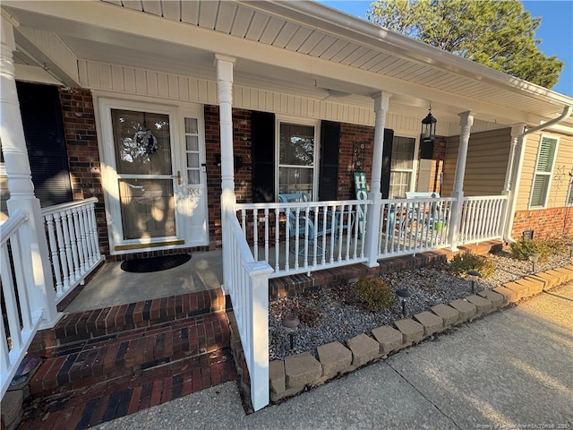 doorway to property with a porch