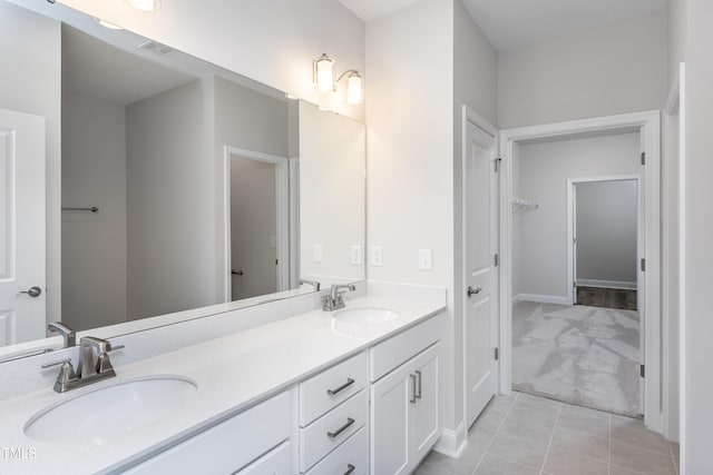 bathroom featuring vanity and tile patterned flooring