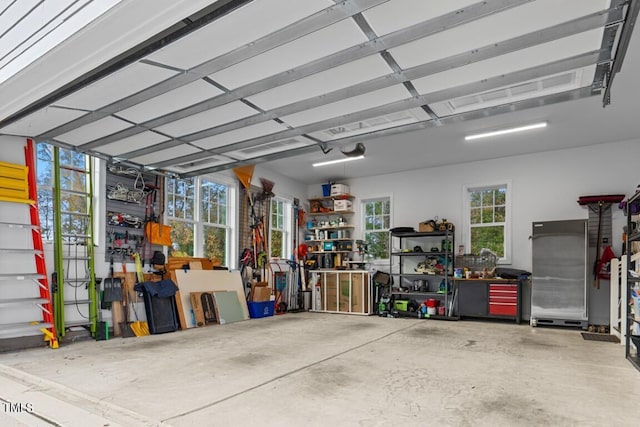 garage with a workshop area