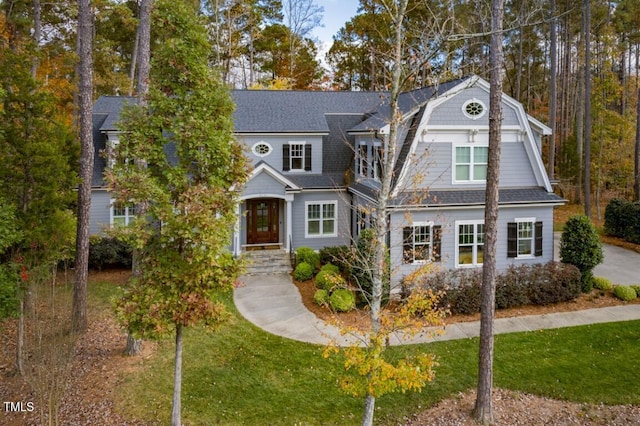 view of front of home with a front yard