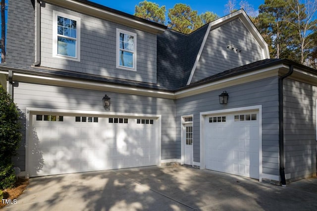 view of property exterior featuring a garage