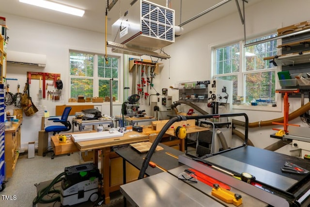 interior space with a workshop area and an AC wall unit