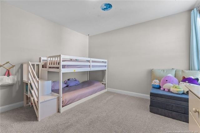 bedroom with light colored carpet