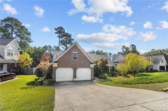 view of front of home with a front lawn and a garage