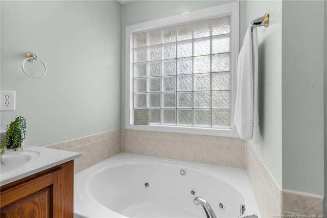 bathroom featuring a tub and vanity