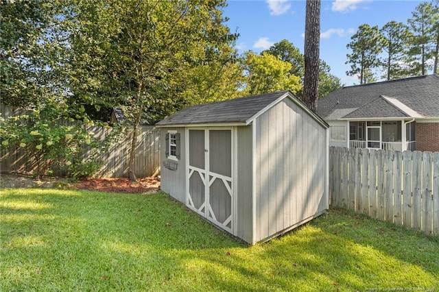 view of outdoor structure featuring a yard