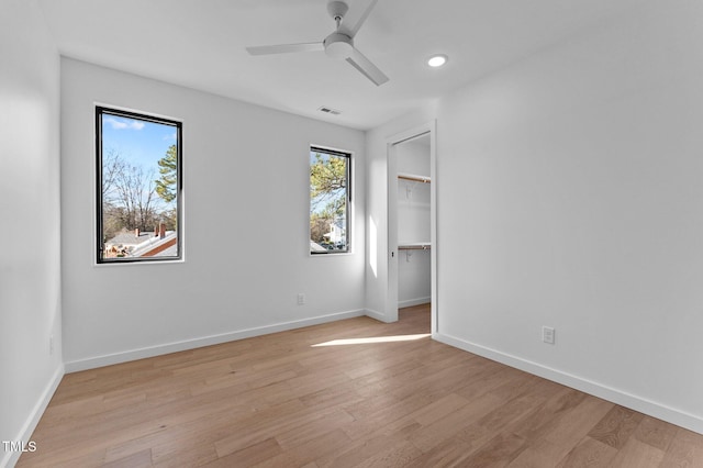 808 Culpepper Ln, Raleigh, NC 27610 - unfurnished bedroom with light hardwood / wood-style floors, a closet, and ceiling fan