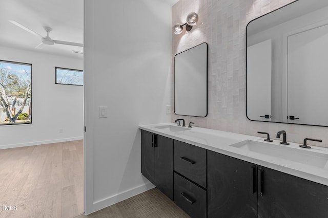 808 Culpepper Ln, Raleigh, NC 27610 - bathroom with vanity, hardwood / wood-style floors, and ceiling fan