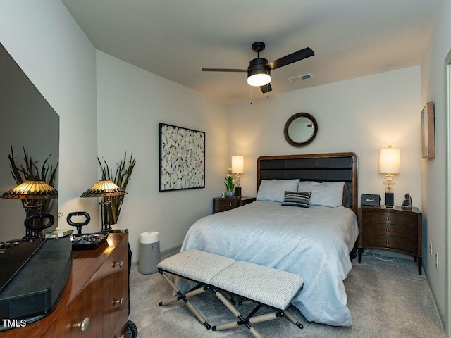carpeted bedroom with a ceiling fan