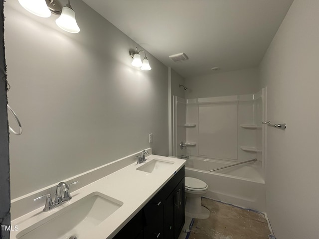 full bathroom featuring a sink, toilet, double vanity, and  shower combination