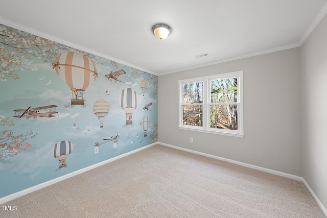 carpeted spare room with crown molding