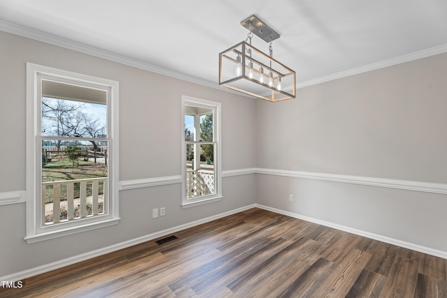 unfurnished dining area featuring crown molding, plenty of natural light, a chandelier, and dark hardwood / wood-style flooring