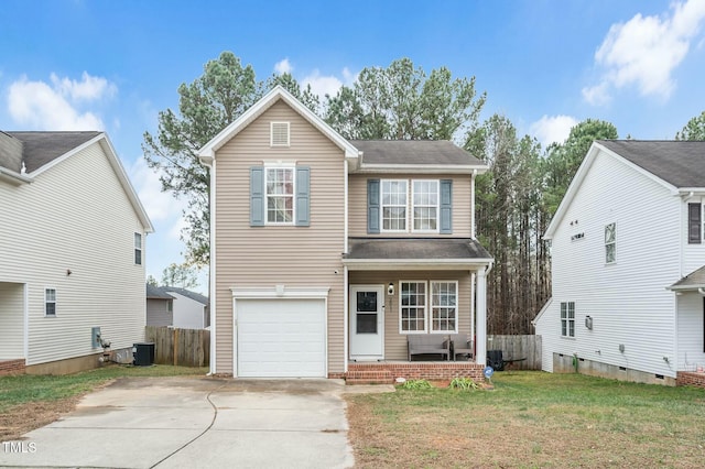 view of front property featuring central AC unit, a front lawn, and a garage