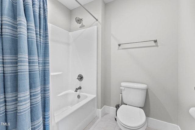 bathroom with shower / bath combo with shower curtain, toilet, and tile patterned flooring