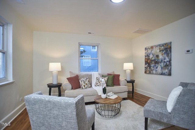 living room featuring dark hardwood / wood-style floors