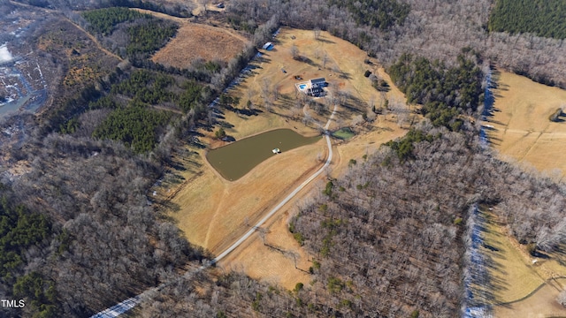 birds eye view of property with a rural view