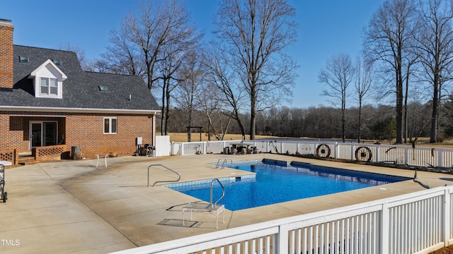 view of pool with a patio area