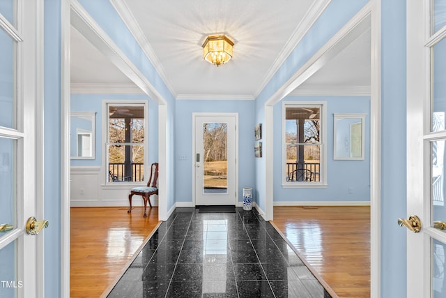 entrance foyer with crown molding