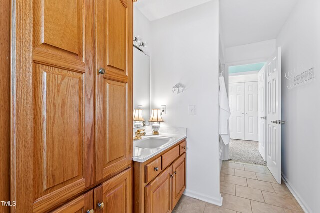 bathroom featuring vanity and tile patterned flooring