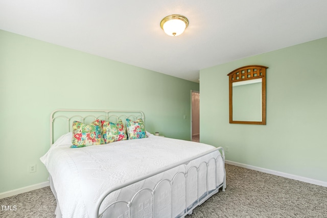 bedroom featuring carpet