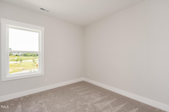 view of carpeted spare room