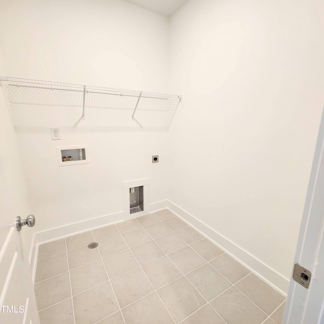 clothes washing area featuring washer hookup, tile patterned flooring, and hookup for an electric dryer