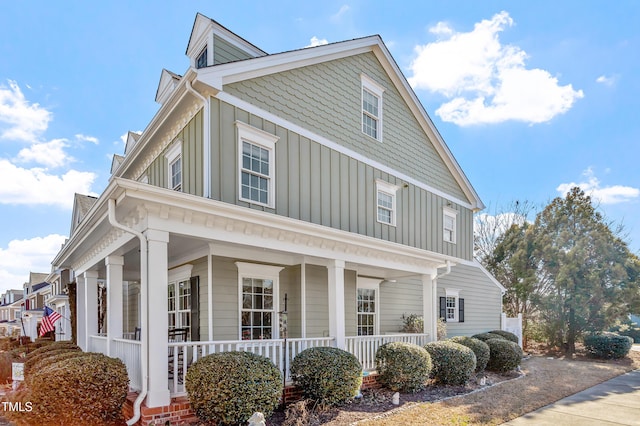 view of property exterior featuring a porch