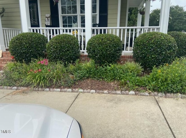 exterior space featuring covered porch