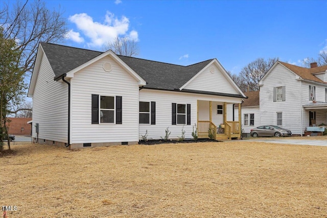 view of front of house with a porch and a front lawn