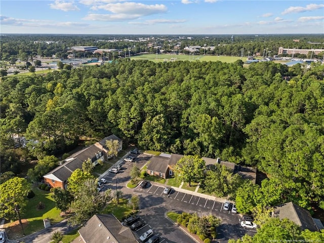 bird's eye view featuring a view of trees