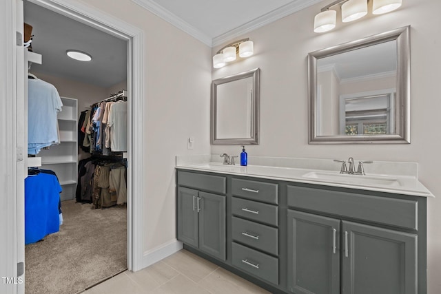 bathroom featuring vanity, tile patterned floors, and ornamental molding