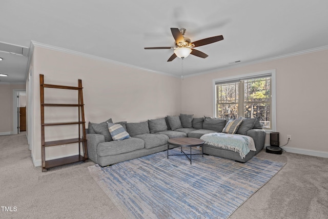 carpeted living room with ornamental molding and ceiling fan