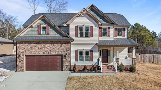 craftsman-style home with a garage and covered porch