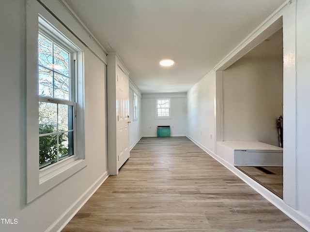 hallway with light wood-type flooring