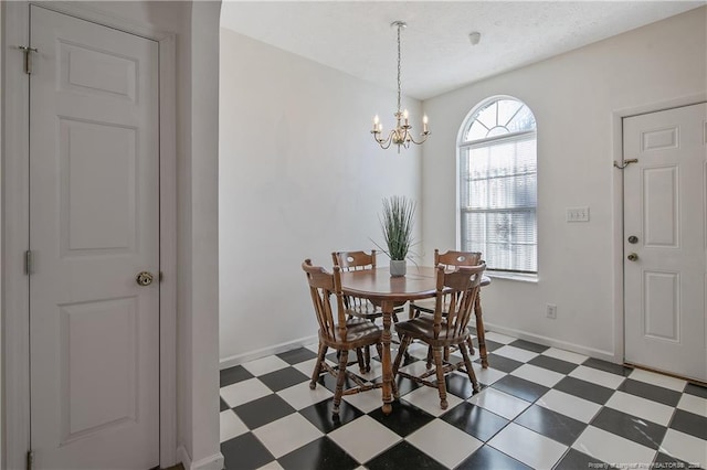 dining room with a chandelier