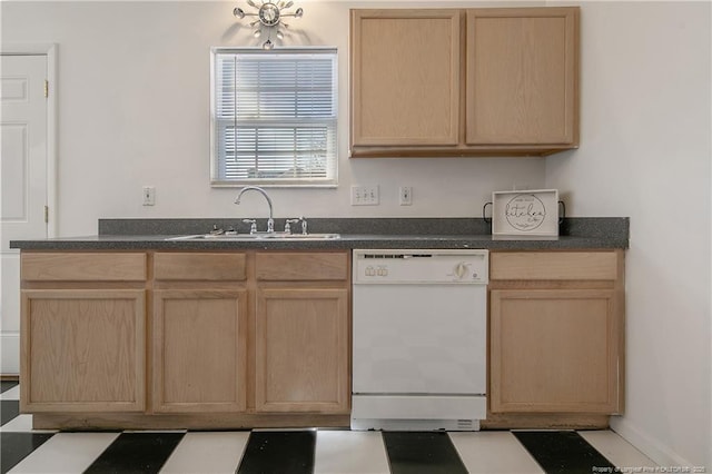 kitchen featuring light brown cabinetry, white dishwasher, and sink