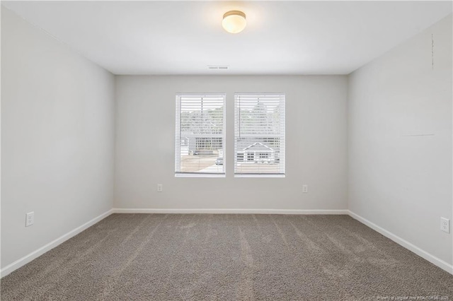 view of carpeted spare room