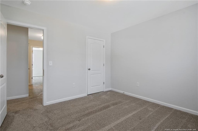 spare room with carpet flooring