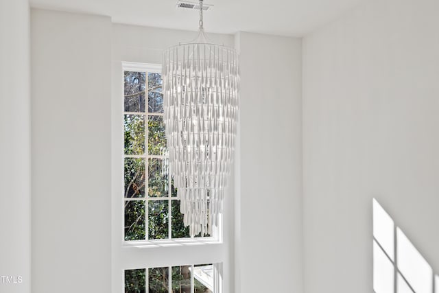 details featuring an inviting chandelier