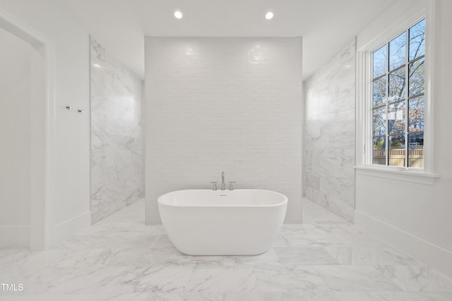 bathroom featuring a bathing tub