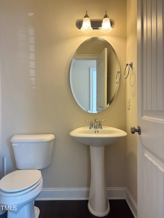 bathroom with sink and toilet