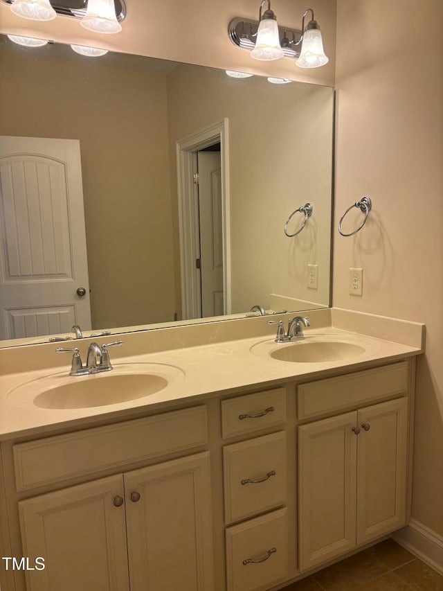 bathroom with vanity and tile patterned flooring